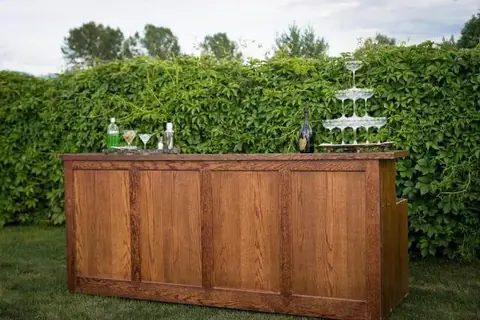 Dark Wood Bar, 8 ft, a rental bar from the Celebrate Event Rentals catalog